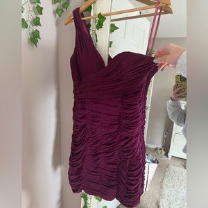 Purple form fitting cocktail dress